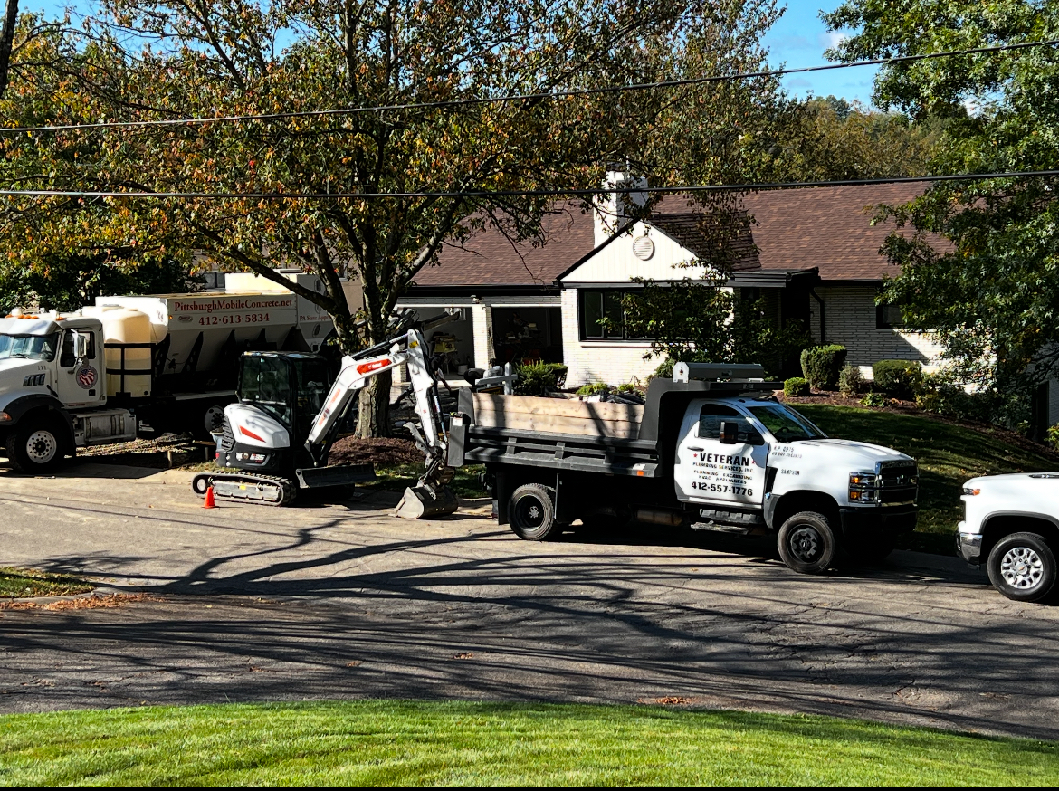 Veteran Plumbing Services work truck at a Sewickley home